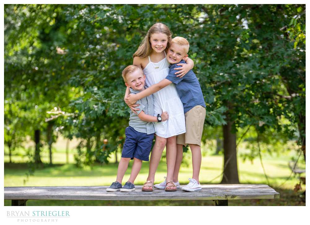 kids standing on table
